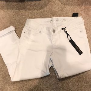Never worn. Express white cropped jeans.